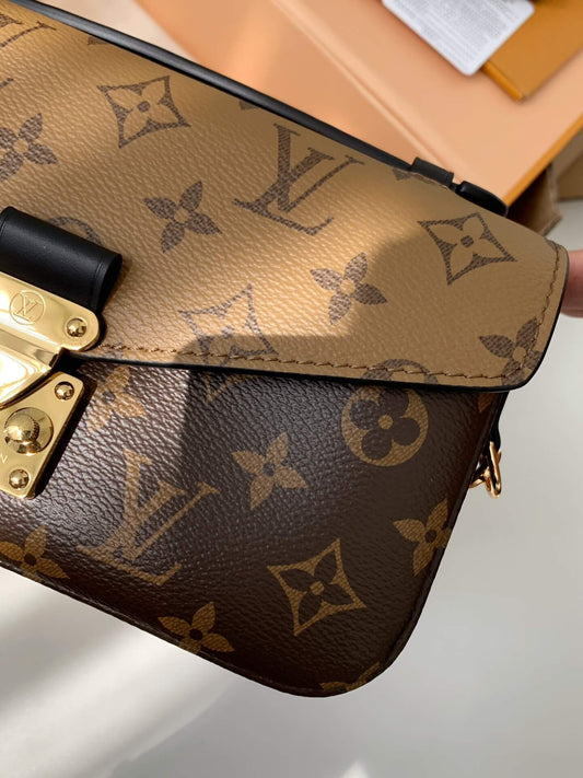 Louis Vuitton LV Bicolour Pochette Métis Monogram Reverse Handbag