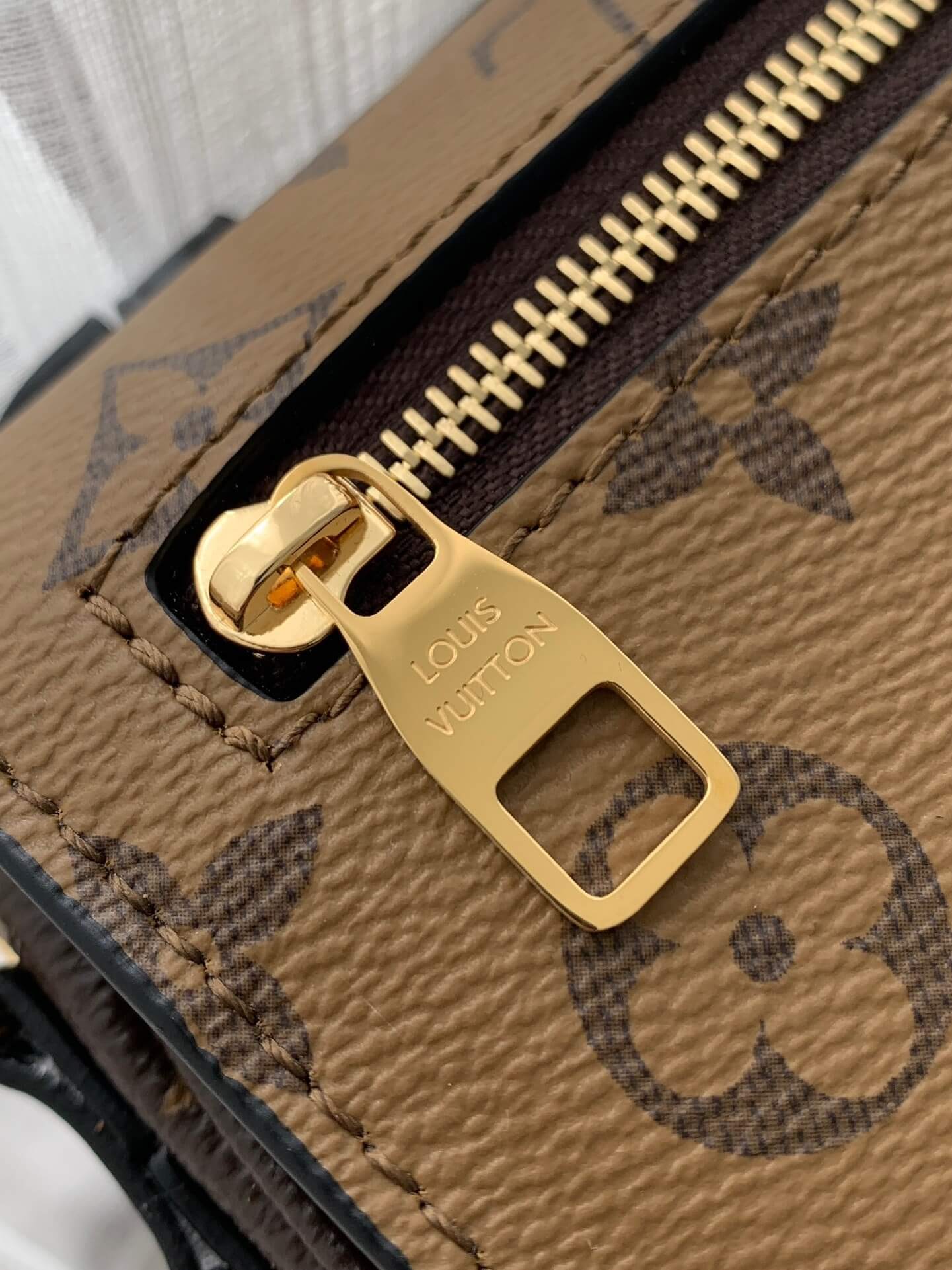 Louis Vuitton LV Bicolour Pochette Métis Monogram Reverse Handbag