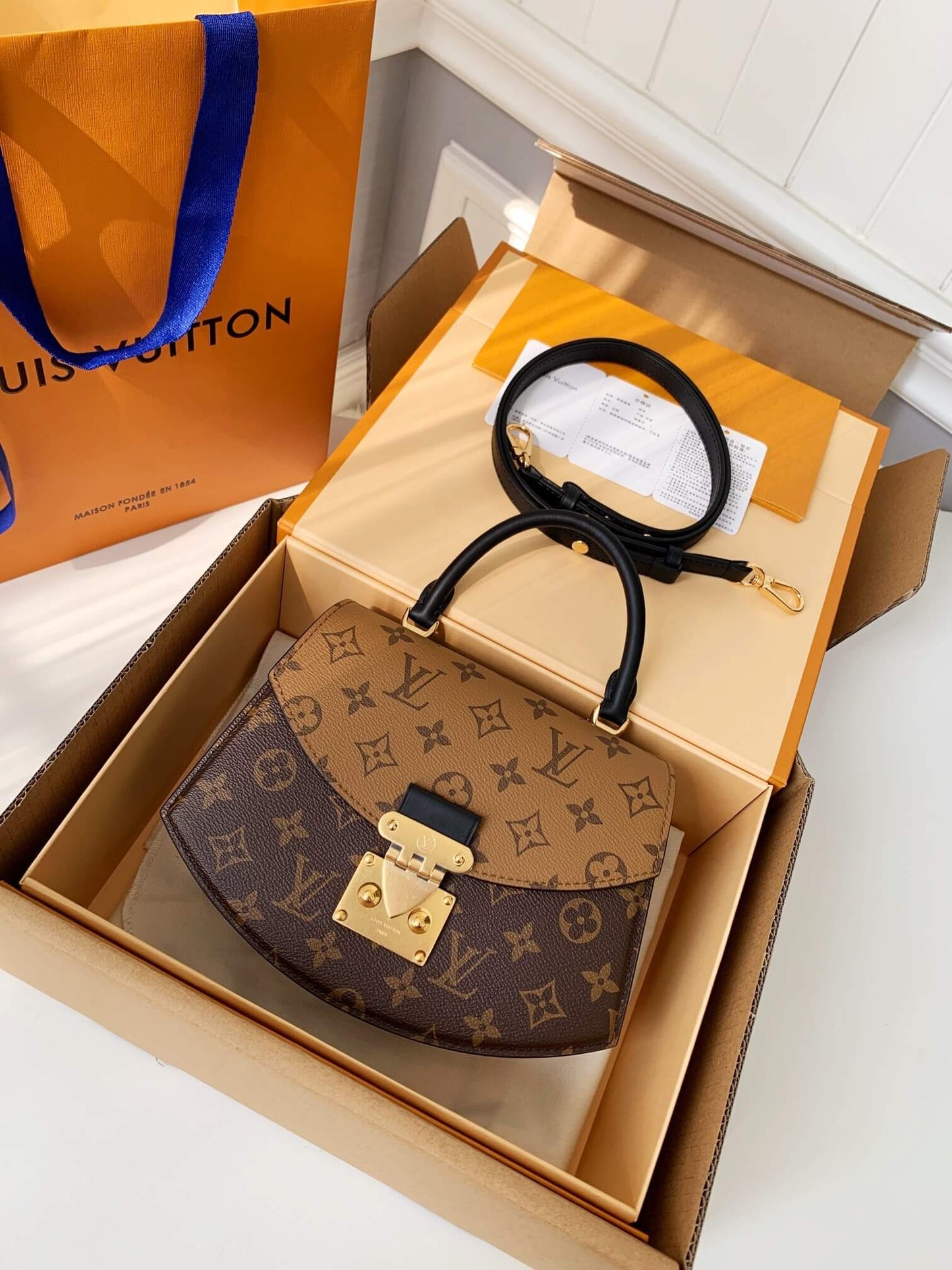 Louis Vuitton LV Brown Tilsitt Handbag in Monogram and Monogram Reverse Coated Canvas