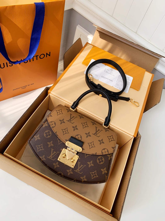 Louis Vuitton LV Brown Tilsitt Handbag in Monogram and Monogram Reverse Coated Canvas