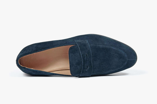 Midnight Navy Blue Suede Penny Loafer – top-down view, highlighting soft suede upper and classic penny strap detailing.