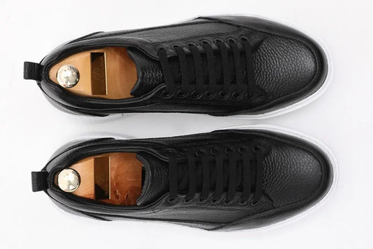 Onyx Luxe Black Leather Sneakers - Elegant Men's Footwear – top-down view of pair, showcasing premium black floater leather and a white sole.