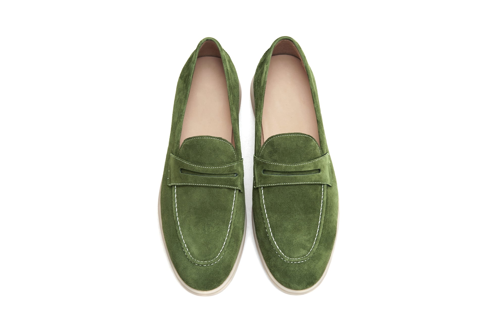 Single olive green suede penny loafer on white background, vamp and strap detail