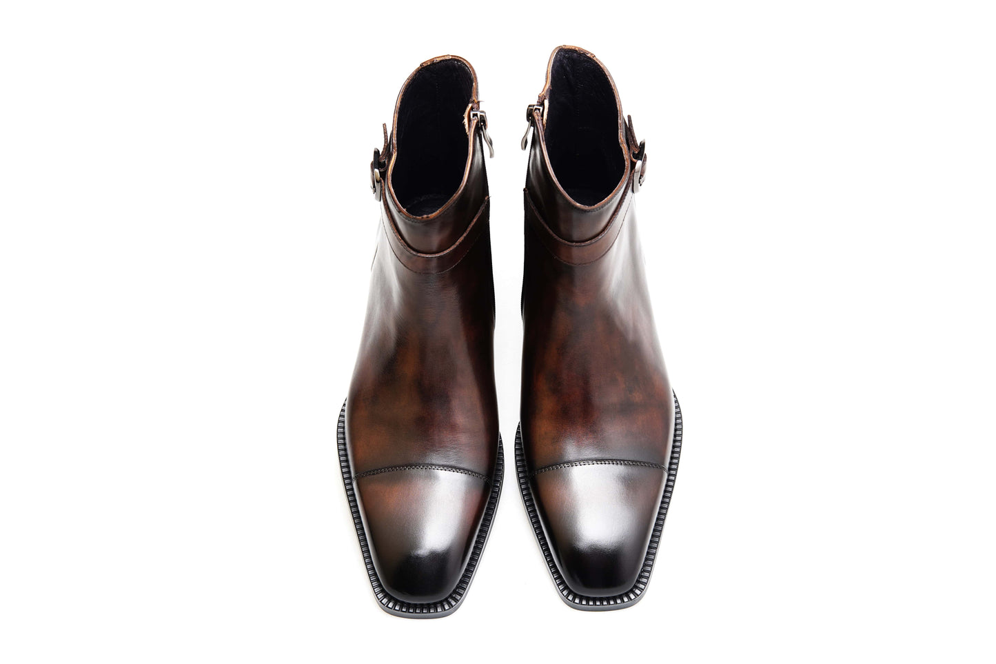Premium Brown Leather Ankle Boots for Urban Adventures – a top-down view of the pair of brown leather boots on a white background.