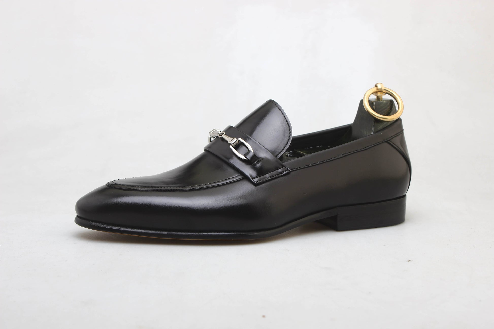 Black patent leather men's loafers with double buckles