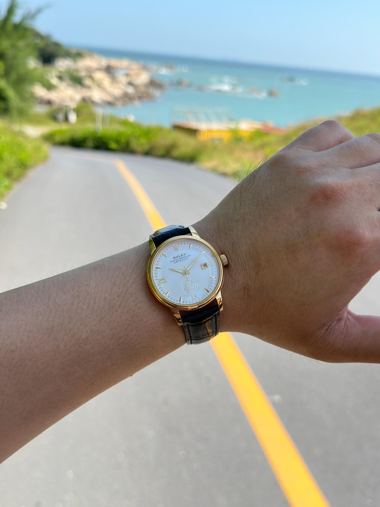 Rolex Datejust 36mm in 18k Yellow Gold with White Dial and Black Leather Strap