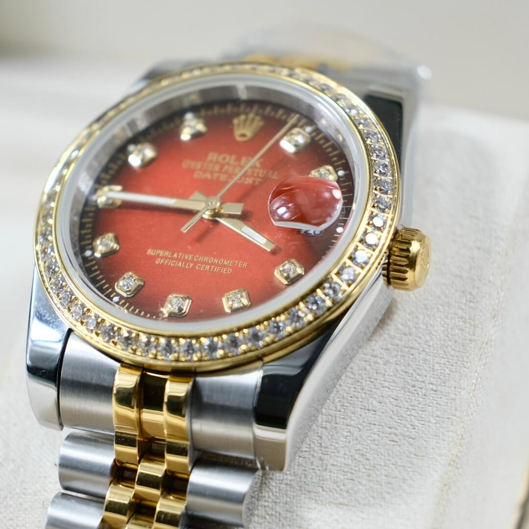 Rolex Datejust 36 Two-Tone with Red Diamond Dial and Jubilee Bracelet.