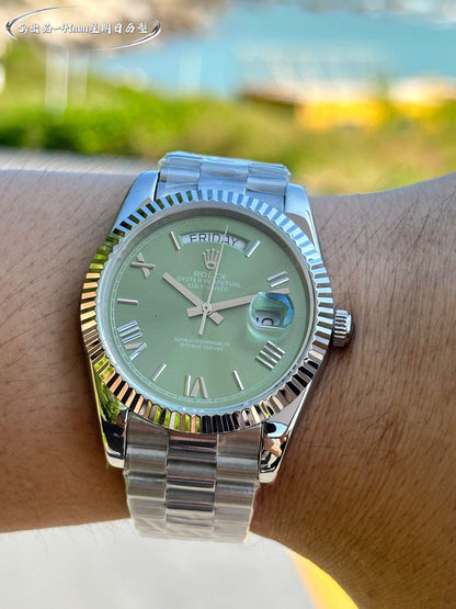 Rolex Day-Date 40 White Gold with Green Roman Dial