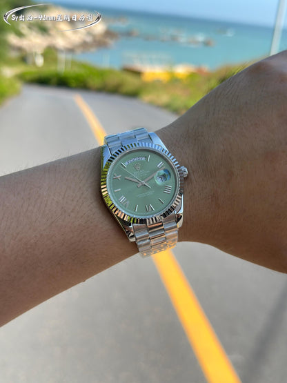 Rolex Day-Date 40 White Gold with Green Roman Dial