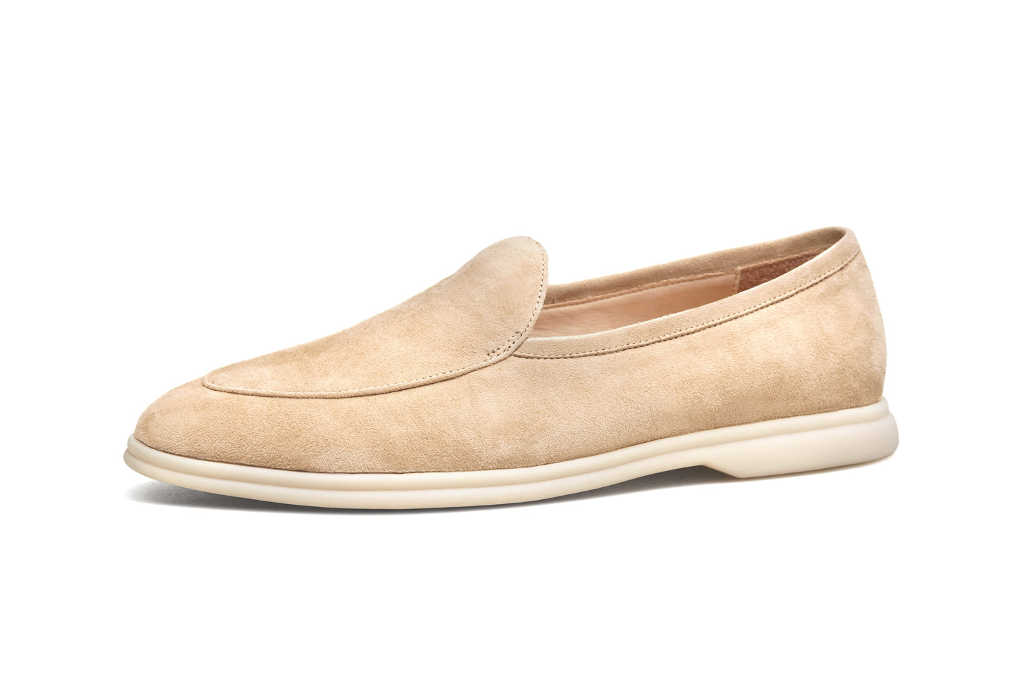 Single Capri tan suede Venetian loafer on white background, side profile
