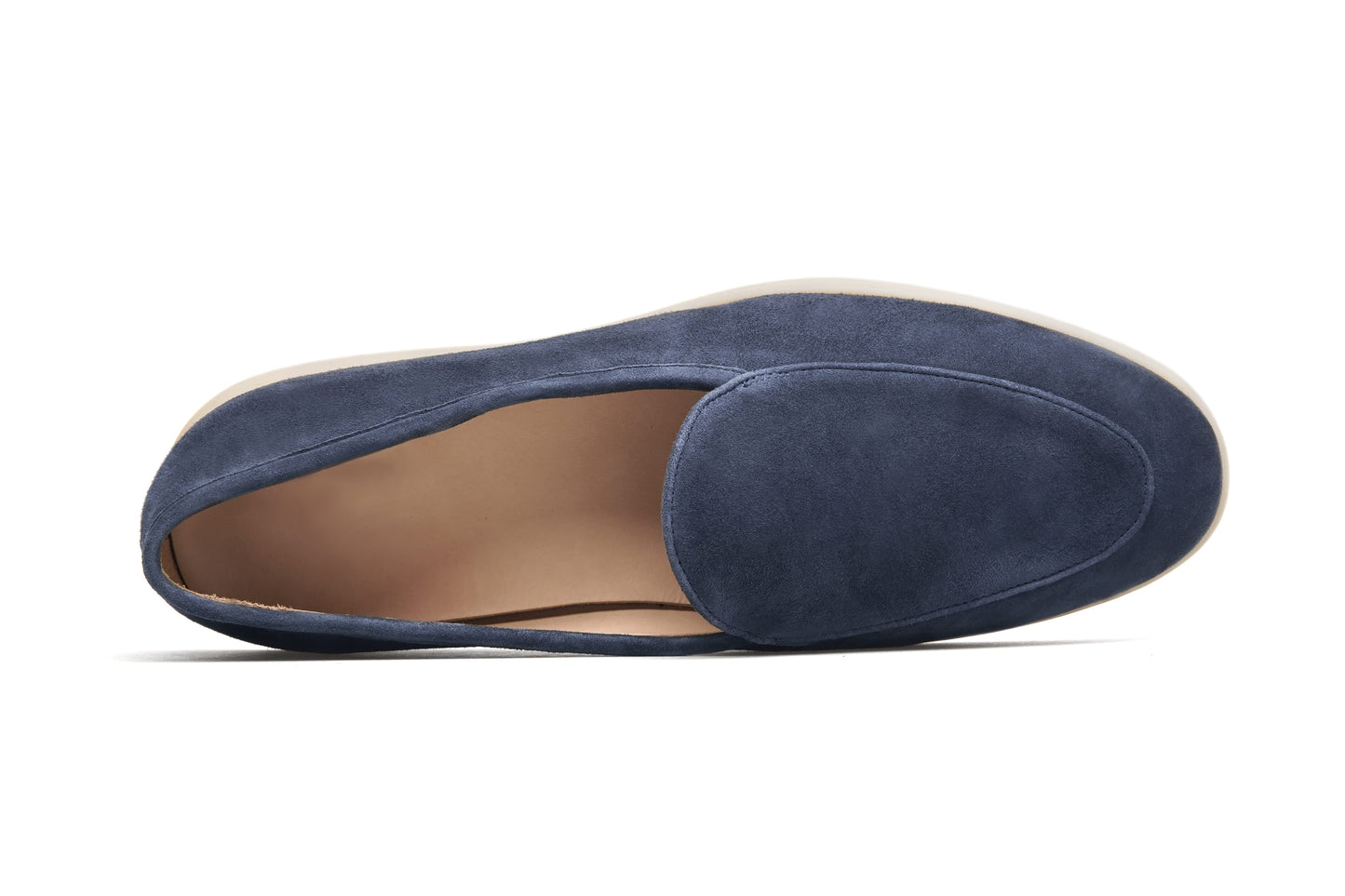 Navy blue suede slip-on loafer on white background, clean vamp detail