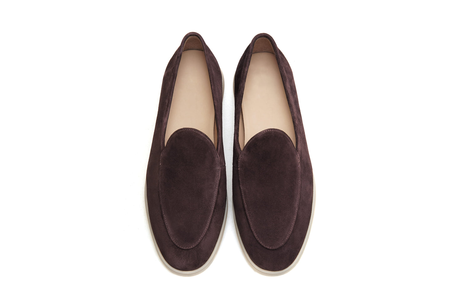 Pair of coffee-brown suede Venetian loafers on white background, front view
