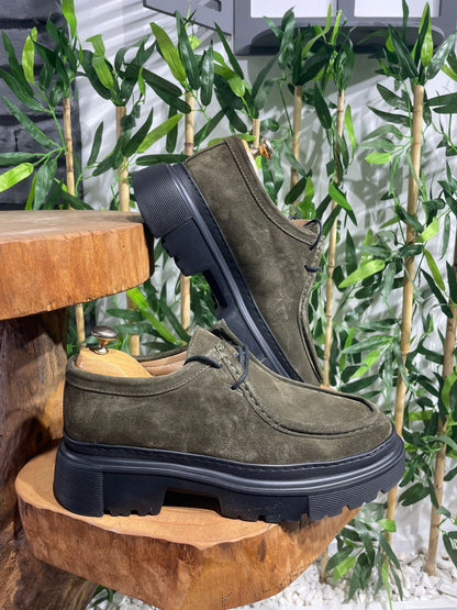 Rugged Khaki Suede Lace-Up Chunky Shoes – displayed on wood with green foliage, ready for urban adventure.