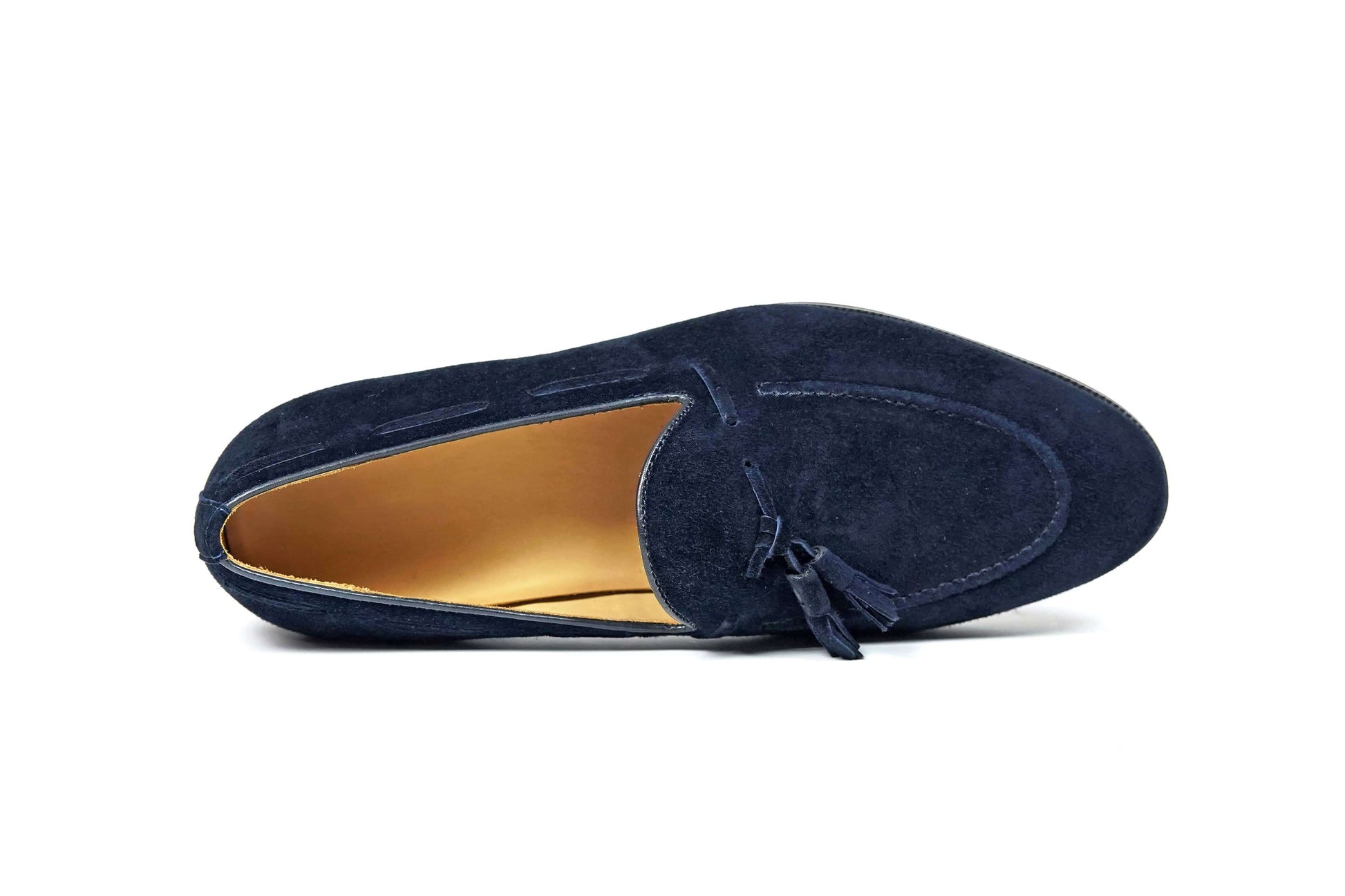 Handcrafted Sapphire Navy Tassel Suede Loafer – top-down view on white background, emphasizing soft navy suede and classic tassel design.