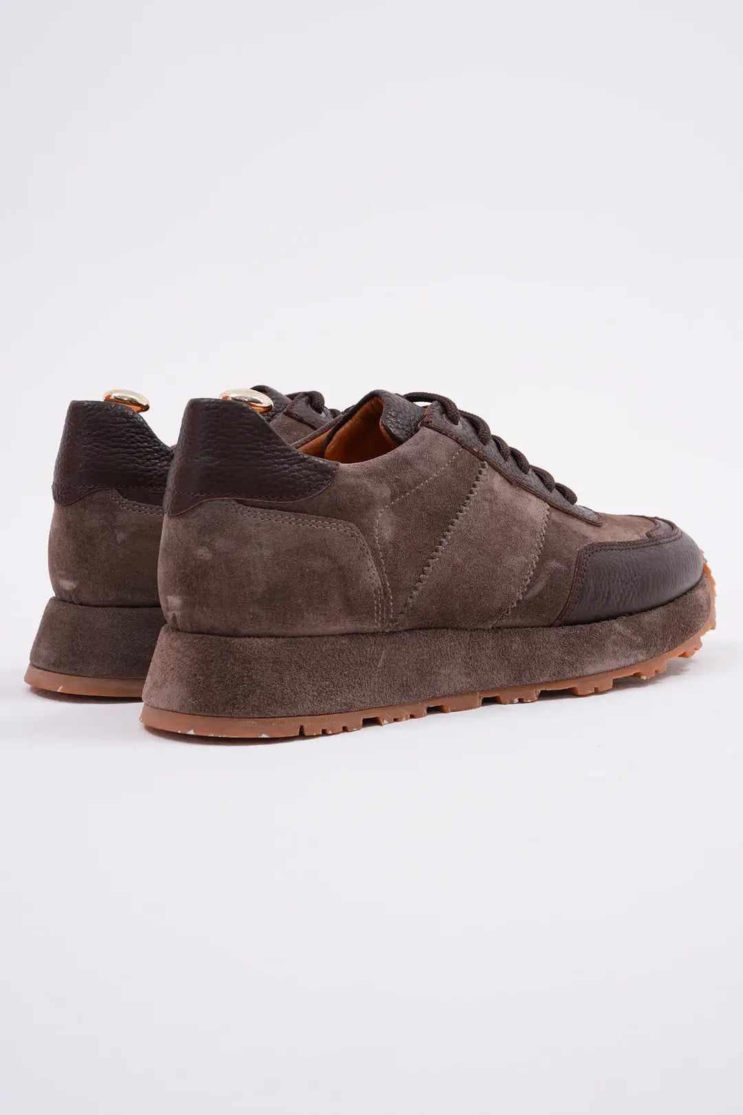 Terrain Rich Brown Suede & Leather Sneakers – pair from a back angle, showcasing smooth and suede textures and a chunky brown EVA sole.