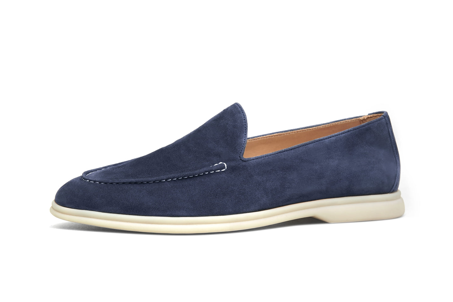 Deep navy suede penny loafer on white background, vamp and strap detail