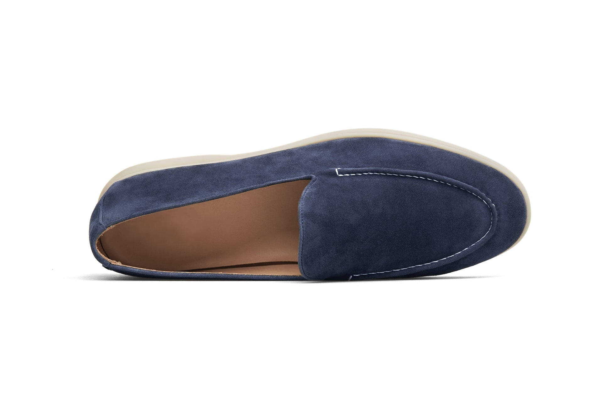 Single deep navy suede penny loafer on white background, side profile