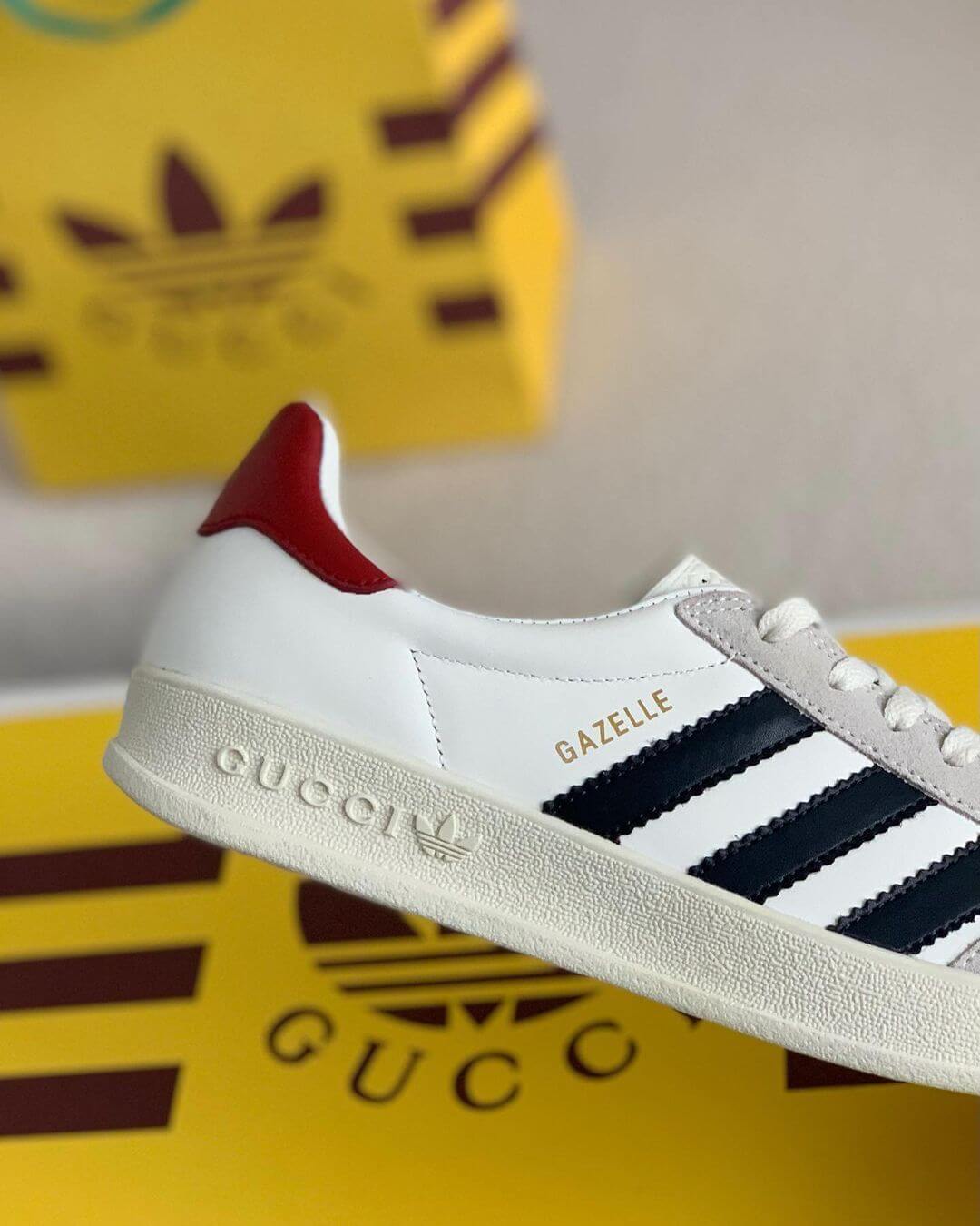 Adidas x Gucci Gazelle Sneaker in White with Black Stripes and Red 