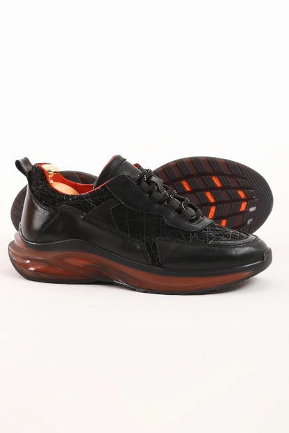 Midnight Raven Luxe Sneaker with premium black leather and red sole accents for men