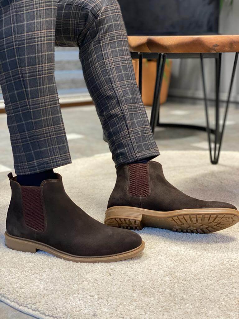 Handmade Brown Suede Leather Chelsea Boots – a pair of brown suede Chelsea boots on a man's feet, showing the bottom tread of the EVA sole.