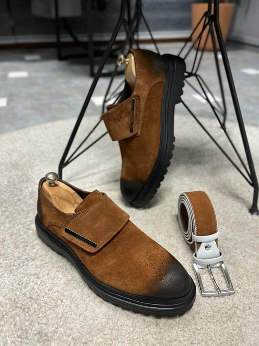 Camel Suede Loafers for Fall & Winter Wear – pair on a white rug with a black chunky Eva sole, showcasing a modern flap closure and sophisticated style.