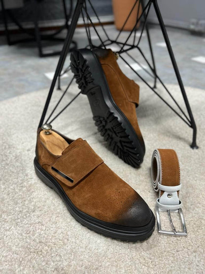 Camel Suede Loafers for Fall & Winter Wear – pair on a white rug with a black chunky Eva sole, showcasing a modern flap closure and sophisticated style.