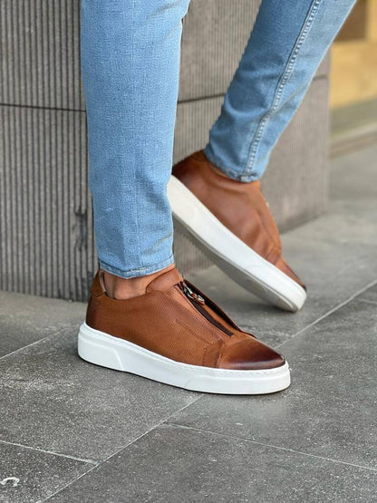 HolloShoe Brown Mid-Top Zipper Slip-Ons for Men – worn with blue cuffed jeans, highlighting a sleek silhouette and a zipper design.