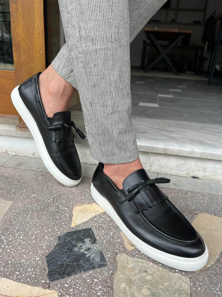 HolloShoe's Black Tassel Slip-On shoes, a perfect blend of style and comfort for any occasion.