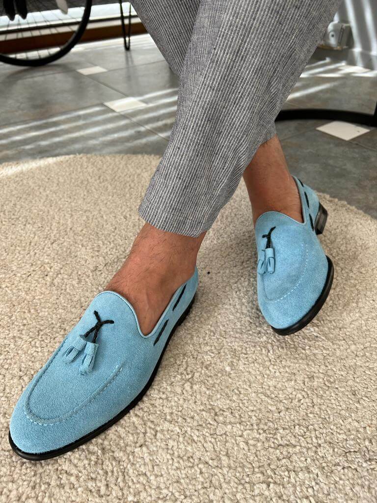 Model wearing HolloShoe's Blue Suede Tassel Loafers - classic and comfortable footwear crafted from 100% suede leather and a neo-lite sole.