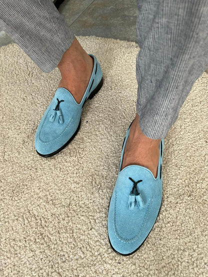 Model wearing HolloShoe's Blue Suede Tassel Loafers - classic and comfortable footwear crafted from 100% suede leather and a neo-lite sole.