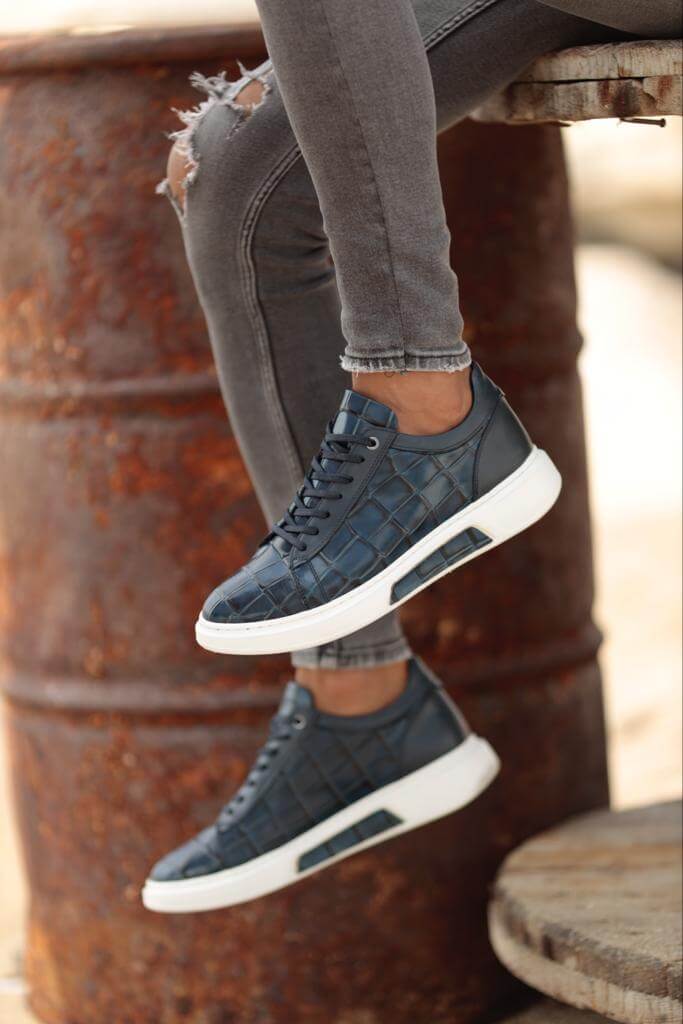 Blue croco leather sneakers made from 100% genuine croco leather with an EVA sole. Bold color and unique texture, perfect for elevating any outfit.